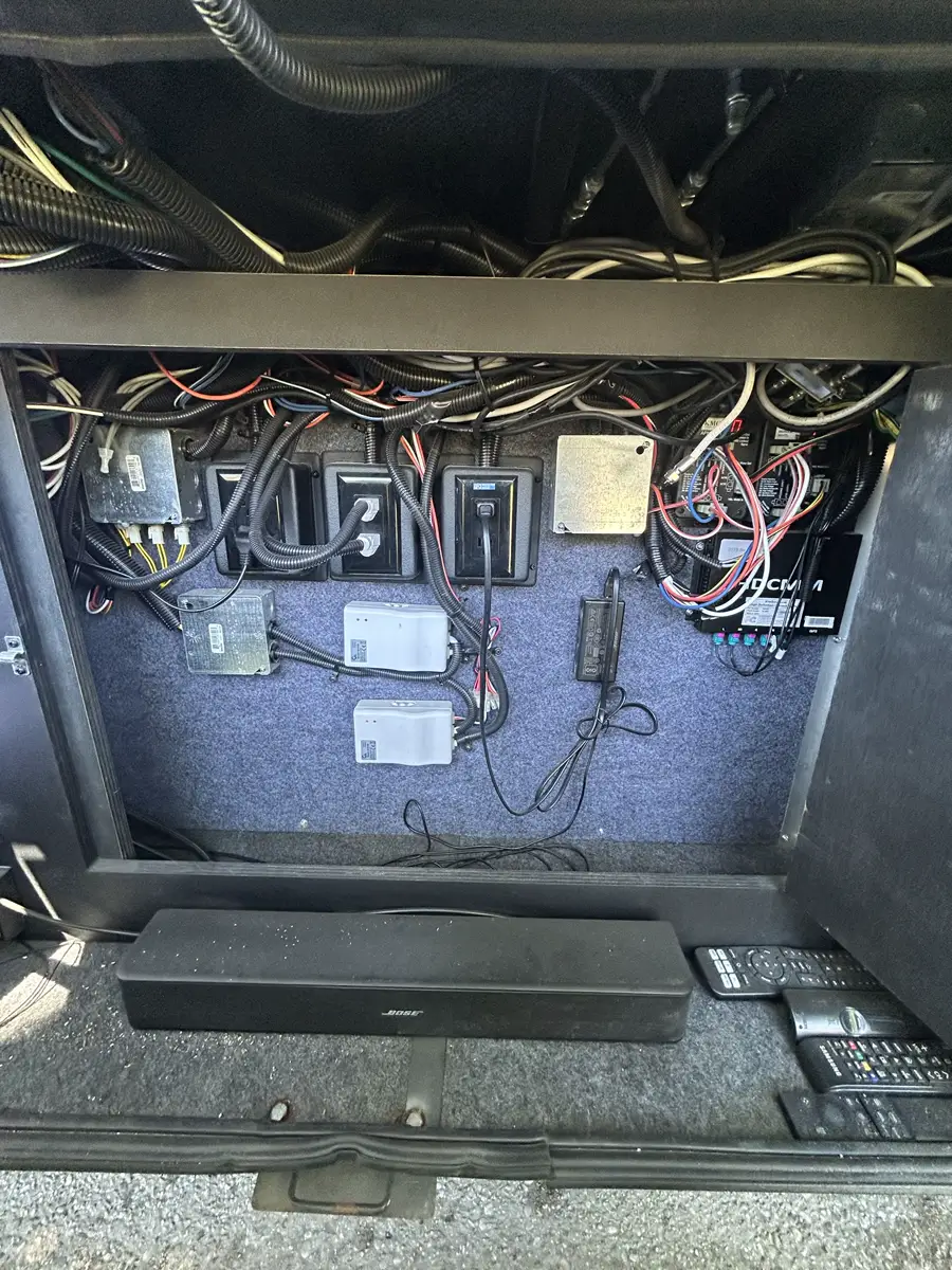 Open RV chassis and running-gear components during a mobile service call.